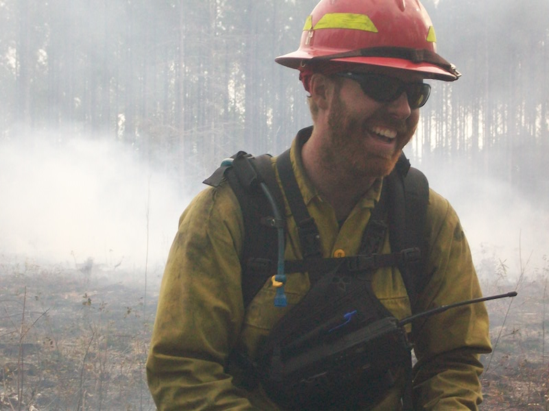 male firefighter smiling