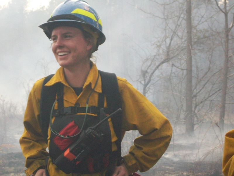 female firefighter smiling