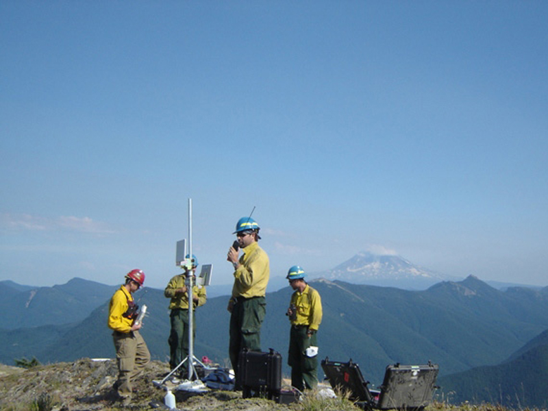 monitoring fires from atop mountain